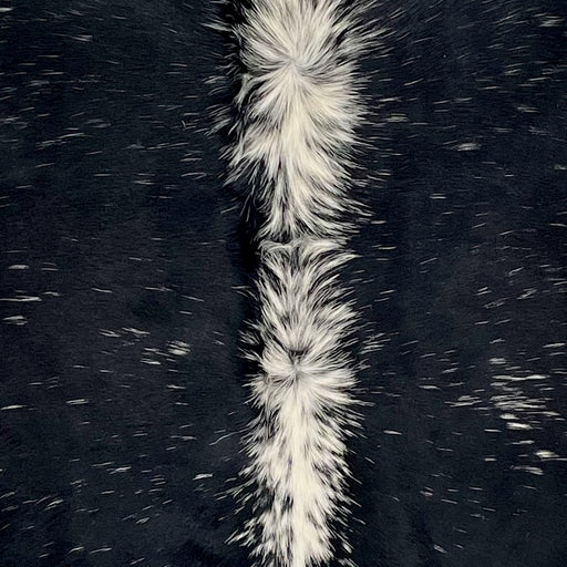 Closeup of this Speckled Brazilian Cowhide, showing black with white speckles, and white down the spine (BRSP3540)