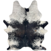 Black and White Speckled Brazilian Cowhide: white with black speckles and spots, mostly solid black on the back, with hints of dark brown across the middle, and one brown spot on the right side of the back - 7'4" x 5'5" (BRSP3543)