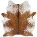 Reddish Brown and White Speckled Brazilian Cowhide: mostly solid reddish brown down the middle of the back, and white with reddish brown speckles and spots on the belly, shanks, and shoulder - 6'10" x 5'6" (BRSP3642)
