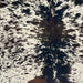 Closeup of this Large Tricolor Speckled Brazilian Cowhide, showing ivory with black and dark brown speckles and spots  (BRSP3680)