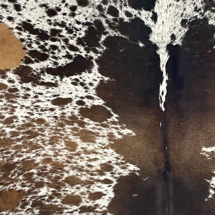 Closeup of this Speckled Brazilian Cowhide, showing white with brown speckles and spots (BRSP3687)