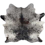 Black and White Speckled Brazilian Cowhide: black and white speckled with a dark brown spot in the middle of the shoulder - 7'1' x 6' (BRSP3702)