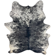 Black and White Speckled Brazilian Cowhide: black with white speckles on the back, and white with black spots and spots on the belly, shoulder, and shanks - 7'4" x 5'4" (BRSP3713)