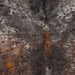 Closeup of this Tricolor Speckled Brazilian Cowhide, showing a mix of black and brown with white speckles and spots (BRSP3778)