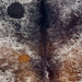 Closeup of this Tricolor Speckled Brazilian Cowhide, showing white with brown and black speckles and spots (BRSP3780)