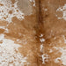 closeup of this Large Speckled Brazilian Cowhide, showing white with caramel speckles and spots (BRSP3781)