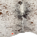 Closeup of this Large Tricolor Speckled Brazilian Cowhide, showing one brand mark on the left side of the butt (BRSP3786)