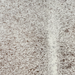 Closeup of this Speckled Brazilian Cowhide, showing white with brown speckles (BRSP3811)