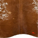 Closeup of this Speckled Brazilian Cowhide, showing one brand mark on the right side of the butt (BRSP3825)