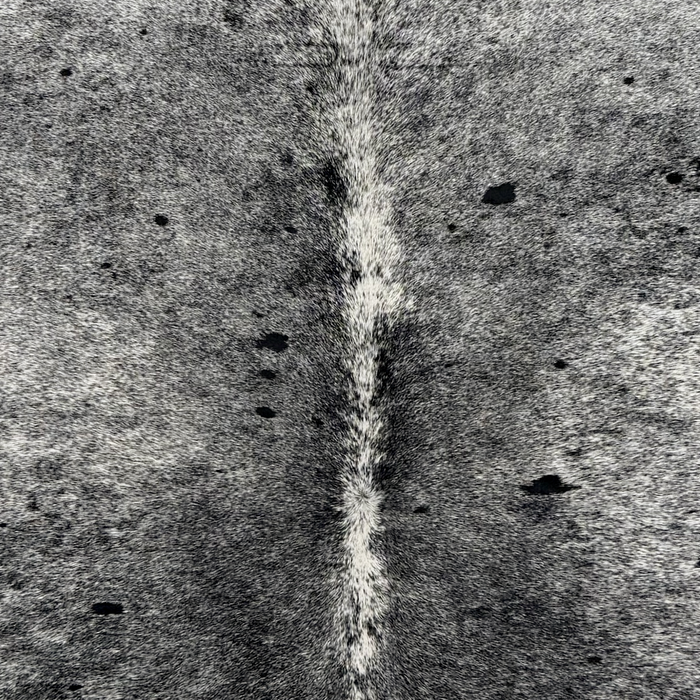 Closeup of this Speckled Brazilian Cowhide, showing white with black speckles and spots (BRSP3839)