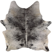 Large Black and White Speckled Brazilian Cowhide: white with black speckles and spots, off-white on the bally and butt, one brand mark on the left side of the butt, and two on the right side of the butt - 7'7" x 6'4" (BRSP3840)
