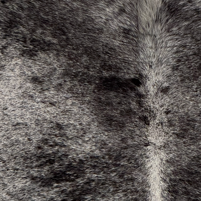 Closeup of this Large Speckled Brazilian Cowhide, showing white with black speckles and spots (BRSP3840)