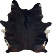 Black and Dk Reddish Brown Brazilian Watusi Cowhide: has a mix of black and dark reddish brown, and white spots on the belly - 7'11" x 6'1" (BRWA092)