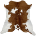 Brown and White Calfskin:  brown with a few white spots, and it has white on the belly and hind shanks - 3'2" x 2'10" (CALF629)