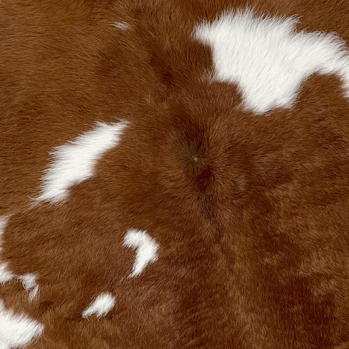 Closeup of this Calfskin, showing mostly brown, with a few white spots (CALF662)