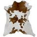 White and Brown Calfskin:  white with brown spots, and it has a large, brown spot in the middle of the shoulder - 3'6" x 2'11" (CALF710)