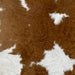 Closeup of this Calfskin, showing white with large and small, brown spots (CALF767)