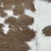 Closeup of this Calfskin, showing white with large and small, taupe spots (CALF771)