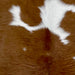 Closeup of this Calfskin, showing brown with small and large, white spots   (CALF789)