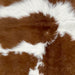 Closeup of this Calfskin, showing white with large, brown spots (CALF841)