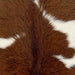 closeup of this Calfskin, showing brown with white spots  (CALF865)