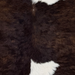 Closeup of this Calfskin, showing white with dark brown spots (CALF899)