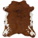 Reddish Brown and White Calfskin: has long hair that is reddish brown, with a few small, black spots, and white spots on the belly and shanks - 3'3" x 2'10" (CALF910)
