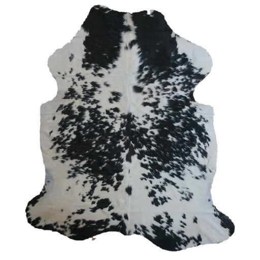 Black and White cowhide rug, 7'6" x 6'5", shown on white background (CH-031)