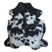 Black and White cowhide rug, 7'3" x 6'6", shown on white background (CH-039)