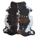 Tricolor cowhide rug, 7' x 6'4", shown on white background (CH-048)