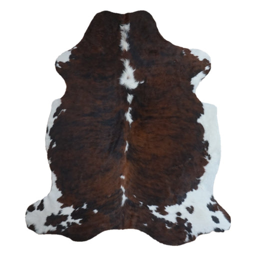 Tricolor cowhide rug, 7' x 6'3", shown on white background (CH-051)