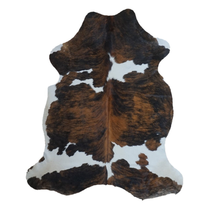 Tricolor cowhide rug, 7' x 5'9", shown on white background (CH-071)