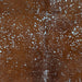 Closeup of this Solid Brown, Colombian Cowhide, showing a metallic, Sky Blue Acid Wash (COAW425)