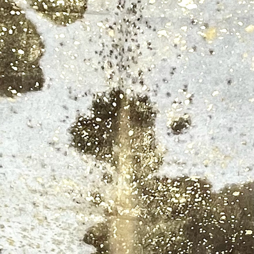 Closeup of this Large Colombian Cowhide, showing white with brown spots, and a metallic, gold acid wash (COAW523)