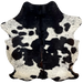 Black and White Speckled Colombian Cowhide:  white with black speckles, large and small, black spots, and a touch of dark brown on the spine, and off-white with black speckles on the belly and hind shanks - 6'6" x 5' (COBKW235)