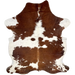 Brown and White Colombian Cowhide: white with faint, brown speckles, and large and small, brown spots - 6'10" x 4'11" (COBNW353)