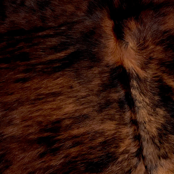 Closeup of this Colombian, Brindle Cowhide, showing dark reddish brown and black (COBR1006)