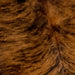 Closeup of this Colombian, Brindle Cowhide, showing reddish brown and black (COBR1012)
