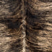 Closeup of this Large, Colombian, Brindle Cowhide, showing light tan with black, brindle markings (COBR1238)