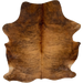 Golden Brown and Black Colombian Brindle Cowhide: golden brown with black, brindle markings, and long red brown hair down the spine - 7' x 5'6" (COBR1569)