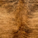 Closeup of this Colombian Brindle Cowhide, showing brown with black, brindle markings, and reddish brown down part of the spine (COBR1616)
