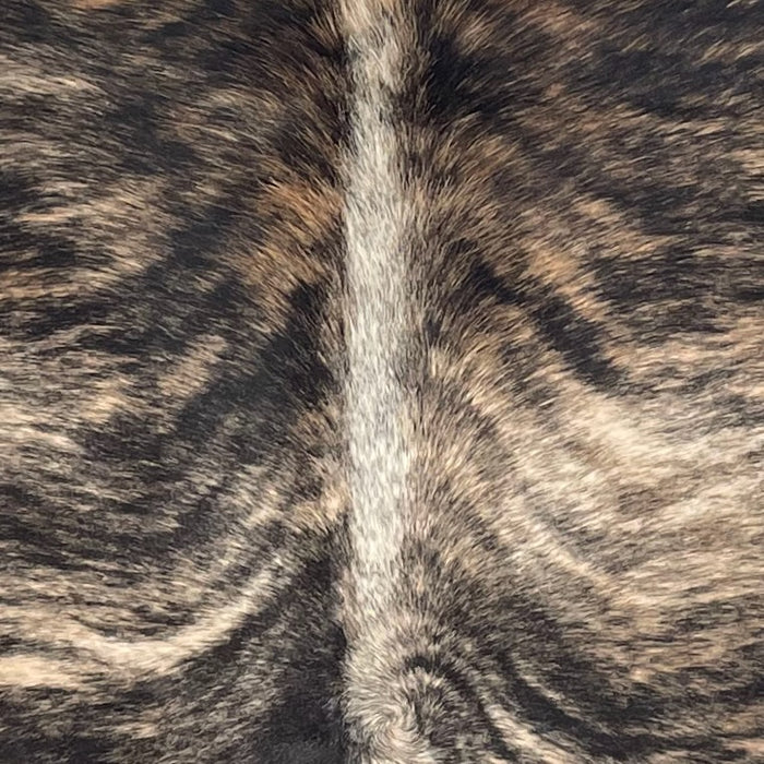 Closeup of this Colombian Brindle Cowhide, showing light brown and white with black, brindle markings (COBR1717)