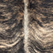 Closeup of this Colombian Brindle Cowhide, showing light brown and white with black, brindle markings (COBR1717)