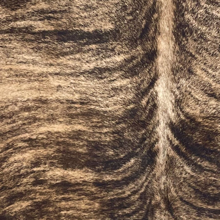 Closeup of this Large Colombian Brindle Cowhide, showing light brown with black, bridle markings  (COBR1721)