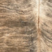Closeup of this Colombian Brindle Cowhide, showing tan and brown with black, brindle markings (COBR1737)