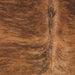 Closeup of this Colombian Brindle Cowhide, showing reddish brown with black, brindle markings (COBR1740)
