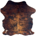 Reddish Brown and Black Colombian Cowhide: reddish brown with black, brindle markings, and a few small, white spots near the edge - 6'9" x 5'3" (COBR1750)