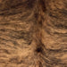 Closeup of this Colombian Brindle Cowhide, showing brown with a black, brindle pattern, and longer hair down the spine  (COBR1751)