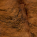 Closeup of this Colombian, Brindle Cowhide, showing reddish brown and black (COBR996)