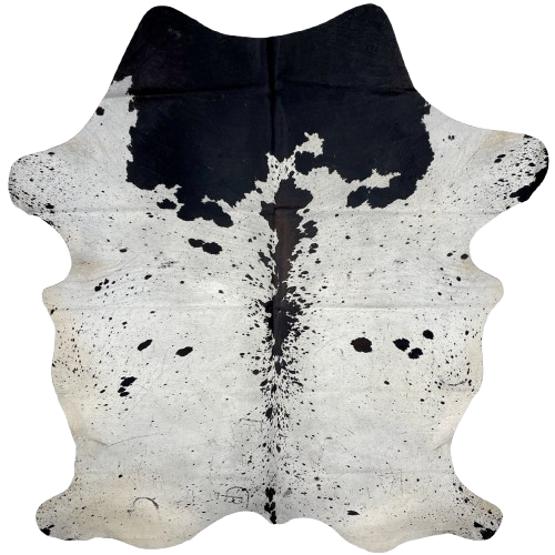 Off-White and Black Speckled Colombian Cowhide: off-white with black speckles and spots, blackish brown down part of the spine, and it has two brand marks on the left side of the butt - 7'1" x 5'3" (COSP2931)